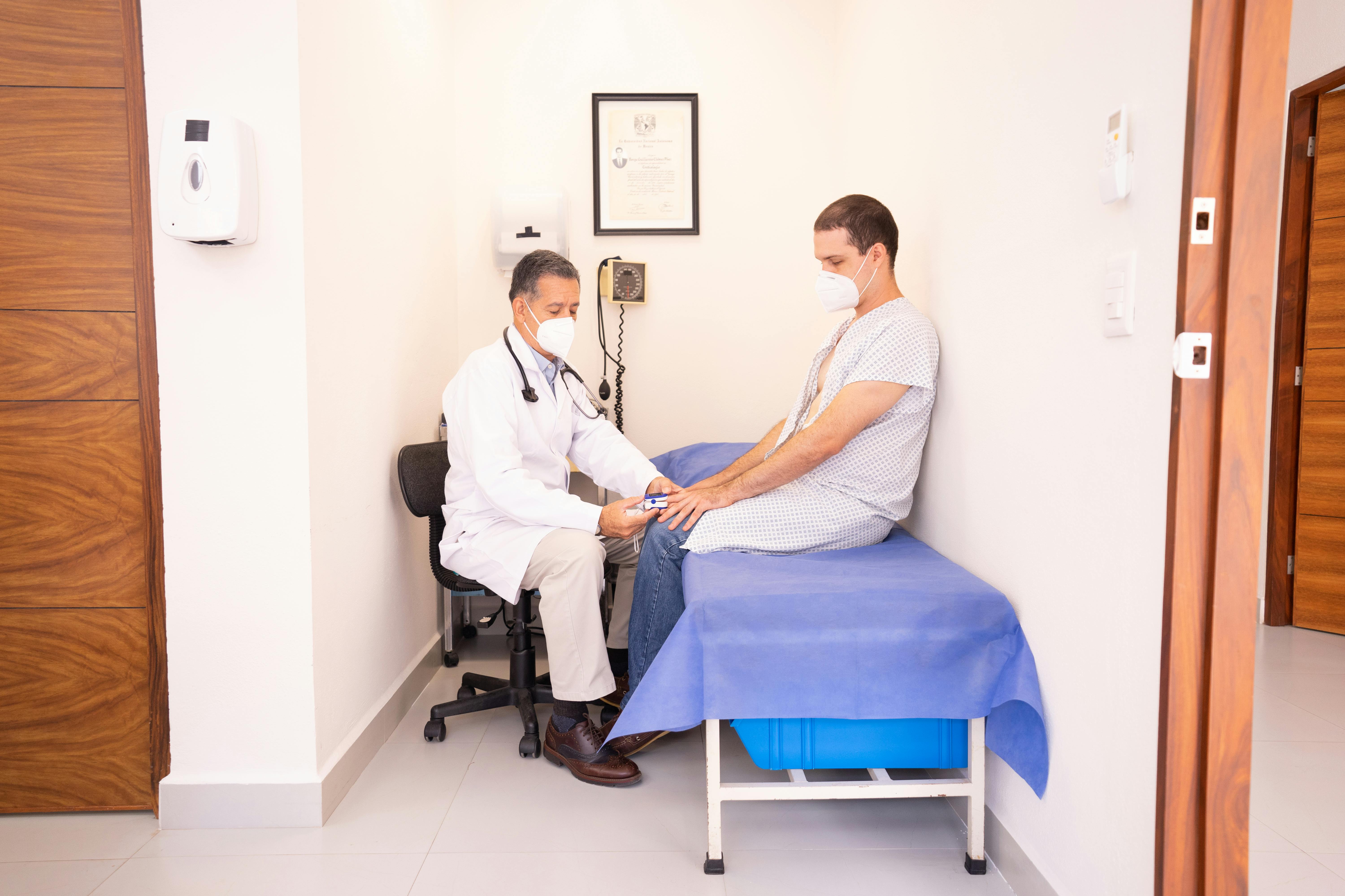 Dr. Dr. Sanaul Hoque with patient